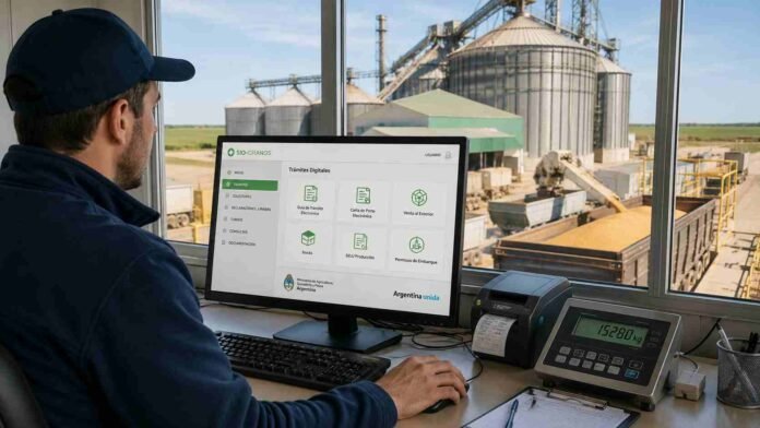 Operador trabajando en sistema digital agropecuario frente a silos y camiones cerealeros en planta de acopio argentina.