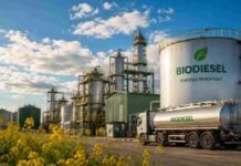 La industria del biodiesel sigue en jaque: opera con 75% de capacidad ociosa y espera una nueva ley para reactivarse Planta industrial de biodiesel con tanques de almacenamiento, camión cisterna y cultivo oleaginoso en primer plano, representando la producción de energía renovable de origen agroindustrial