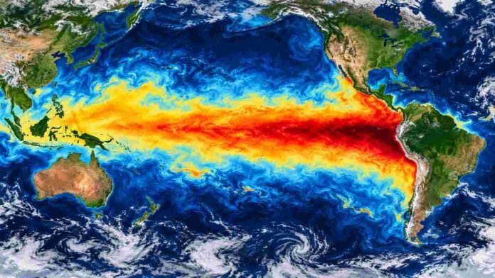 Mapa ilustrativo del océano Pacífico ecuatorial con el calentamiento asociado a El Niño 2026 extendiéndose hacia Sudamérica.